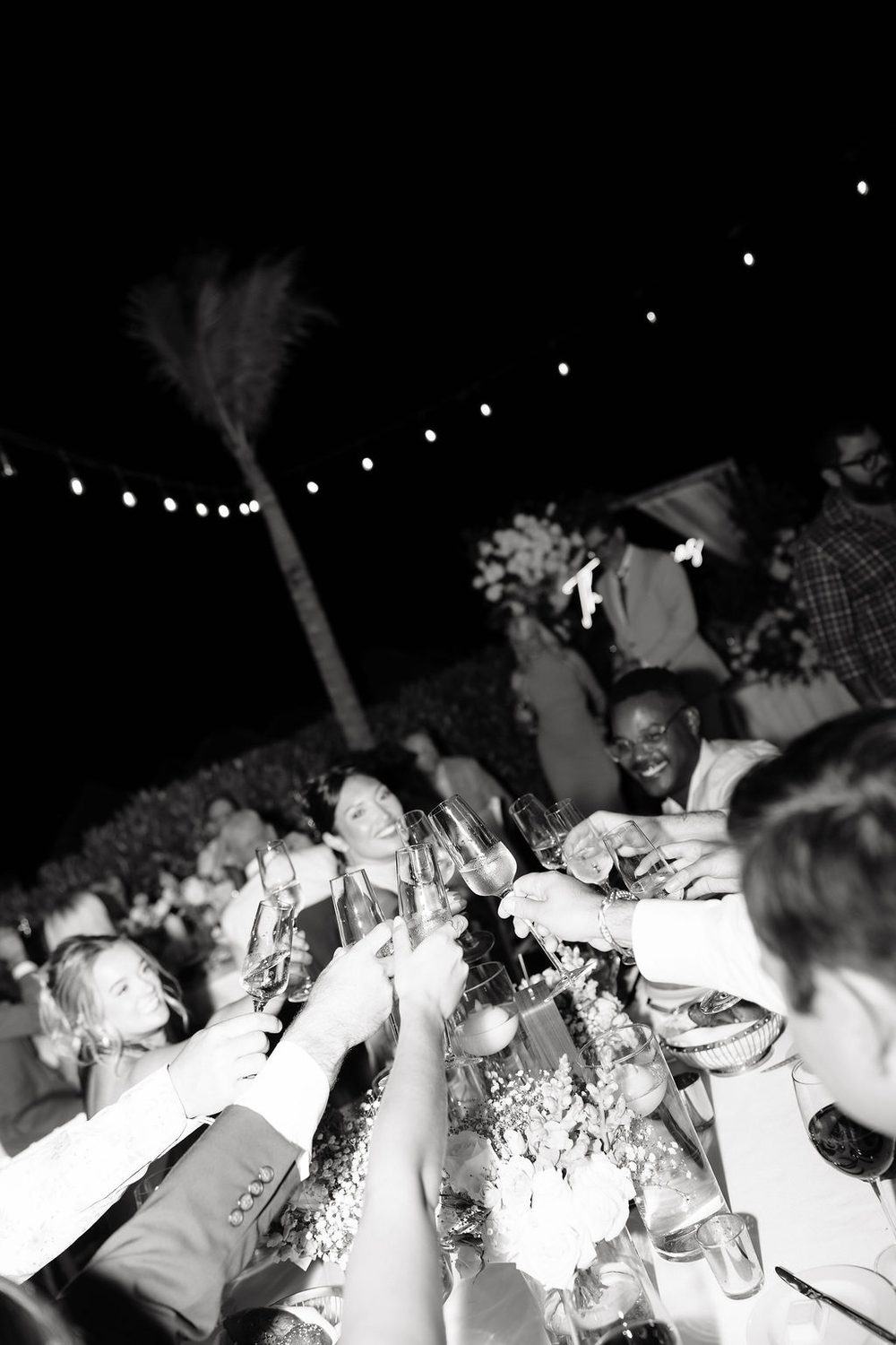 Black and white champagne toast at reception